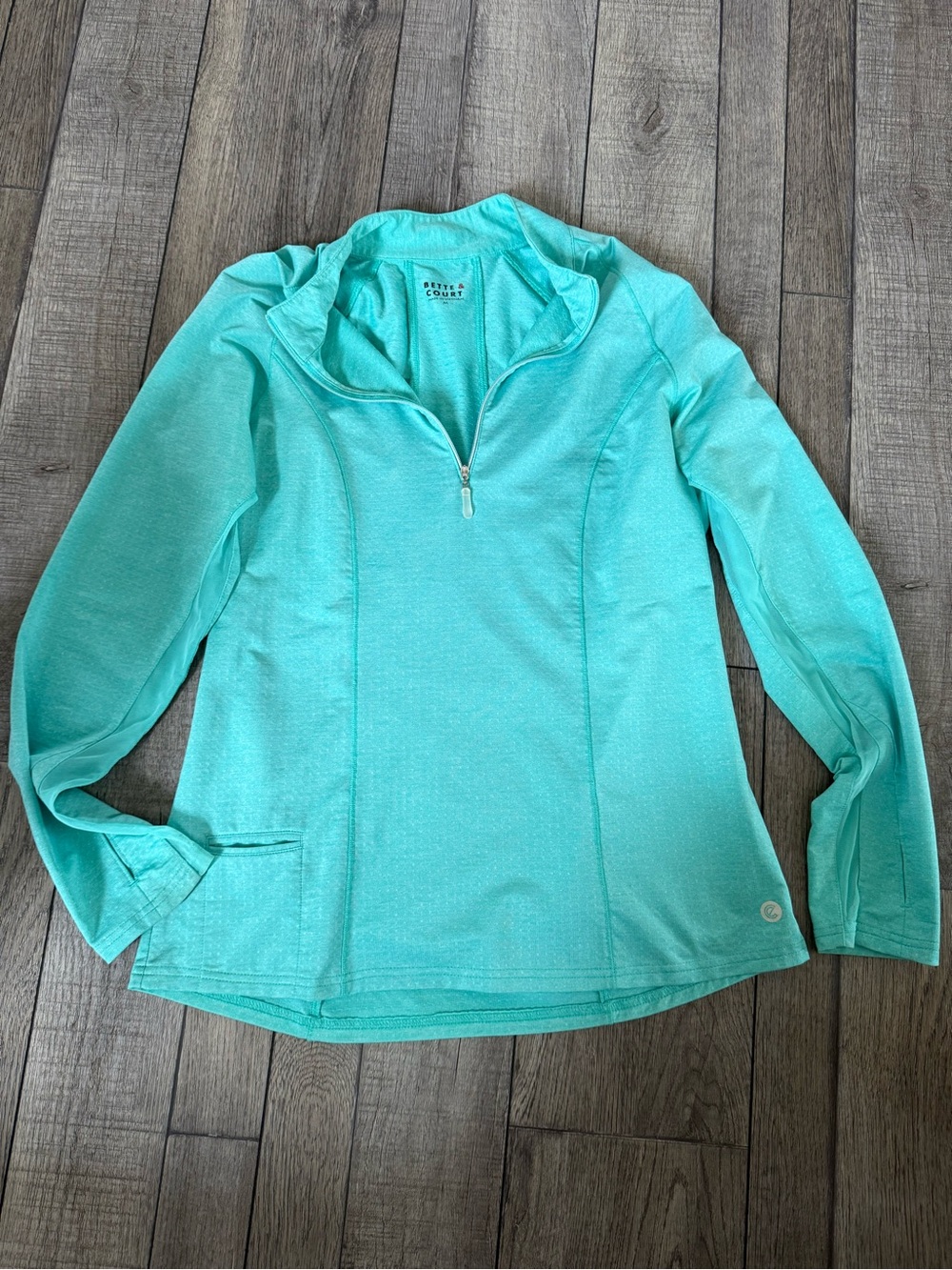 Bette & Court Light Teal Quarter-Zip Long Sleeve Top. Golf and tennis